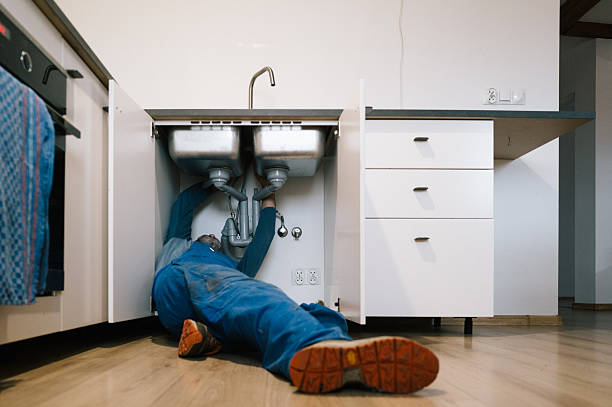 Professional Emergency Plumber technician working in Wakeman, OH